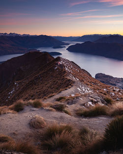 Scenic view of mountains against sky during sunset