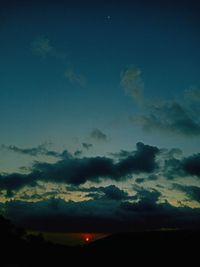 Low angle view of dramatic sky at sunset