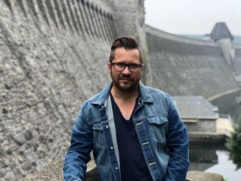 Portrait of man standing outdoors