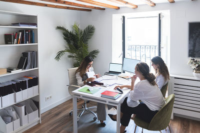 Lawyer and clients discussing in meeting at office