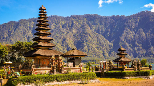 View of temple against building at bedugul, bali, indonesia