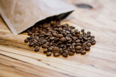 Close-up of coffee beans on table