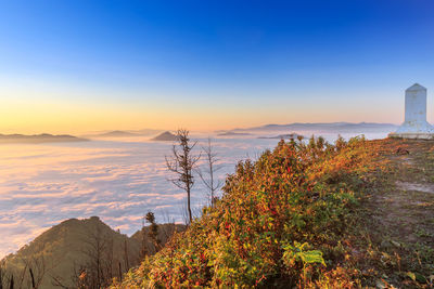 Scenic view of mountains against sky during sunset