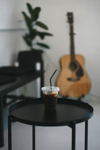 Close-up of drink served on table at home