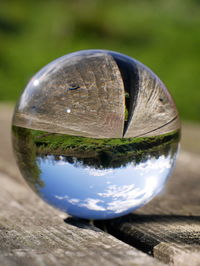 Close-up of glass of ball on table