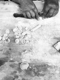 High angle view of person preparing food on table