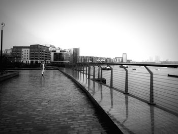 Bridge over river against clear sky