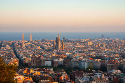 High angle view of cityscape against sky during sunset