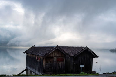 House on field against sky