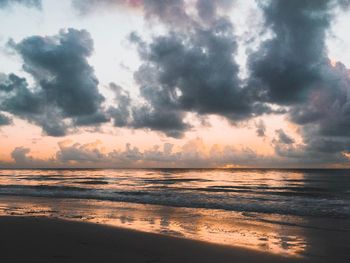 Scenic view of sea against sky at sunset