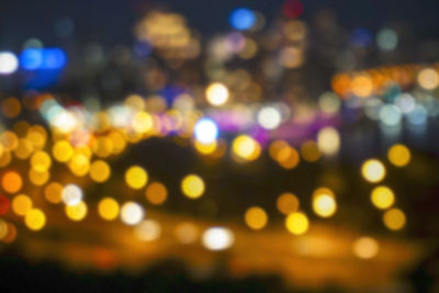 Defocused image of illuminated lights at night