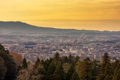 High angle view of townscape against sky at sunset