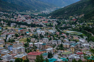 Aerial view of town against sky