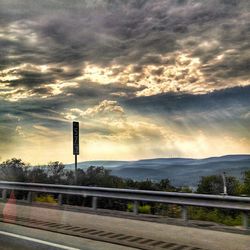 Scenic view of cloudy sky at sunset