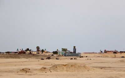 Scenic view of desert against clear sky