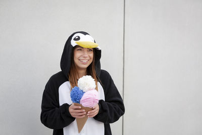 Woman in costume standing outdoors