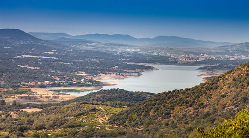 High angle view of landscape and mountains against sky