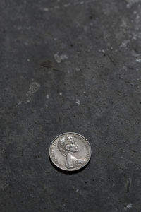 Close-up high angle view of coin