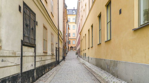 Narrow alley along buildings