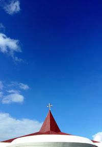 High section of chapel against blue sky