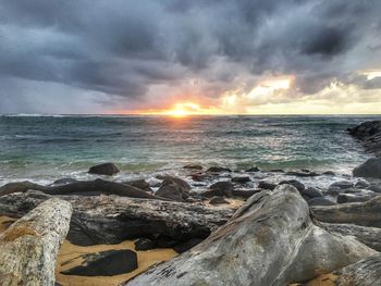 Scenic view of sea against sky during sunset