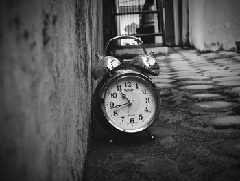 Close-up of clock on wall