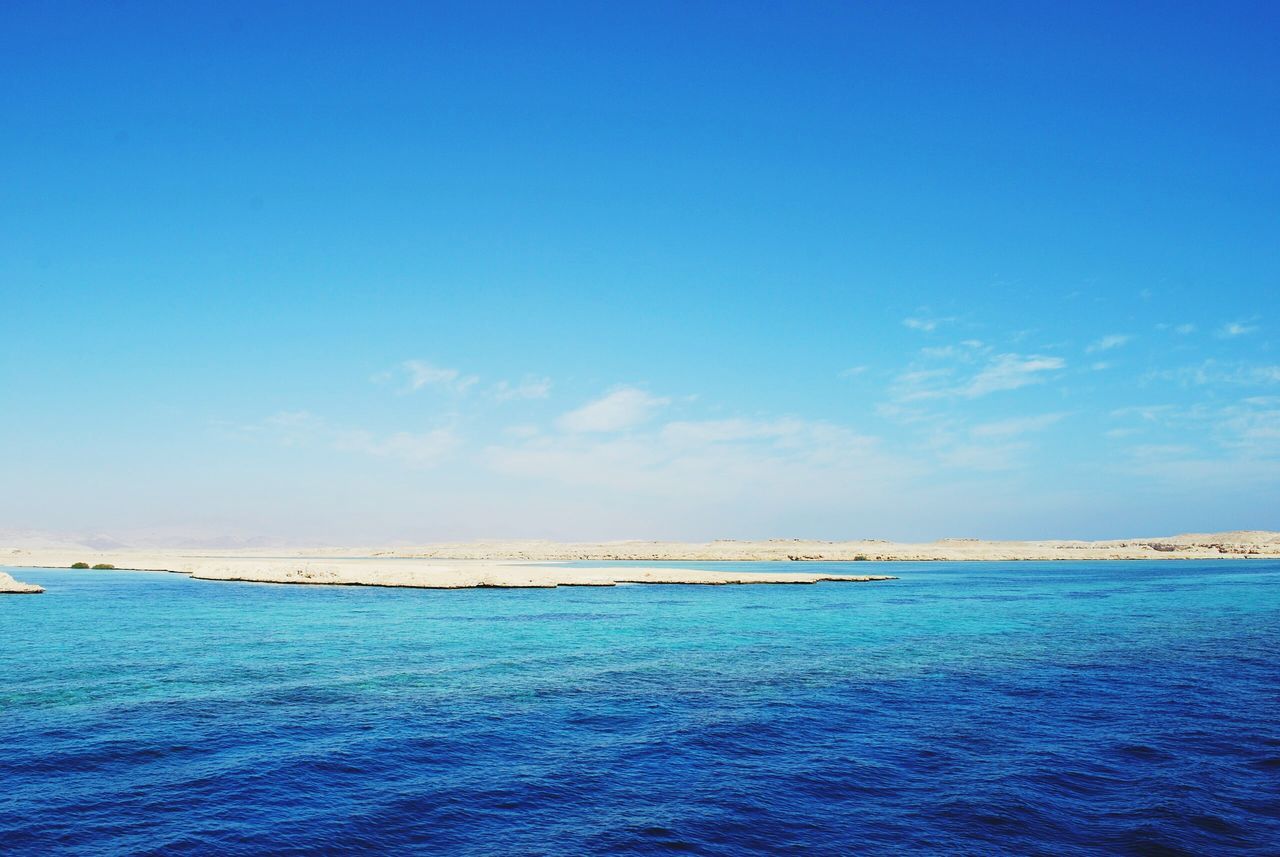 sea, blue, water, waterfront, tranquil scene, tranquility, scenics, horizon over water, beauty in nature, sky, nature, rippled, copy space, idyllic, seascape, day, ocean, calm, outdoors, clear sky