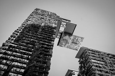 Low angle view of skyscraper against clear sky