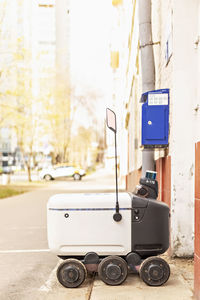 Automatic delivery robot for the transportation of goods and packages.futuristic robot electric car