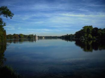 Reflection of clouds in calm lake