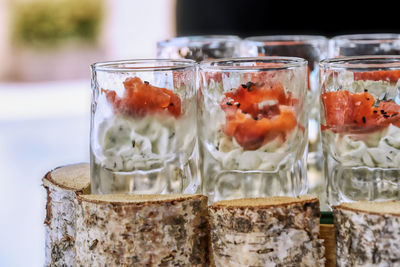 Close-up of fruits in glass jar on table