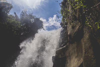 Low angle view of fountain against sky