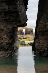 View of rock formation against sky