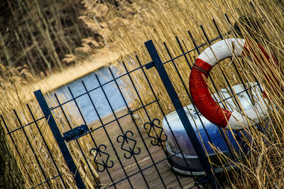 Rubber ring on railing against plants