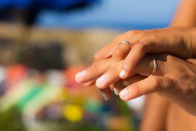 Cropped image of hand holding glass