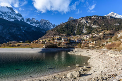 Scenic view of mountains against cloudy sky