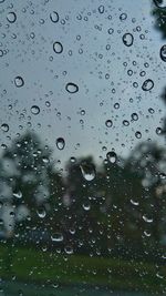 Close-up of water drops on glass