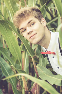 Portrait of young man standing outdoors