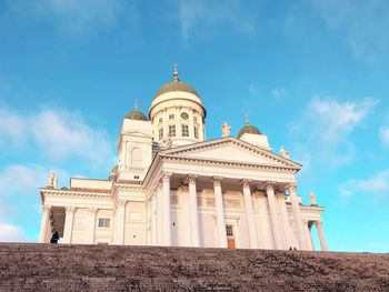 Low angle view of cathedral against cloudy sky