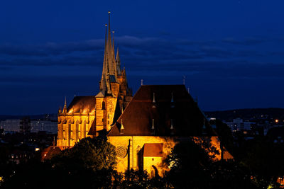 Cathedral against sky at night