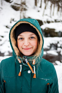 Portrait of smiling boy in snow