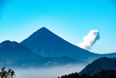 Volcan santa maria with santiaguito puffing in the background