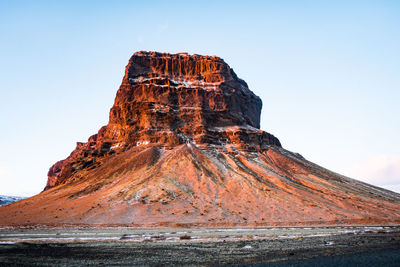 Scenic view of desert against clear sky