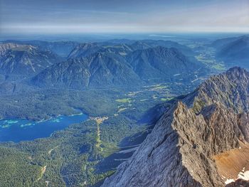 Aerial view of mountain range against sky