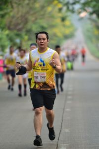 Full length portrait of man running