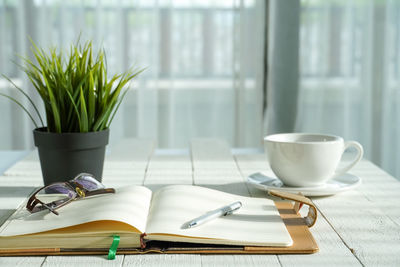 Close-up of coffee cup on table