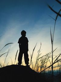 Woman standing on field