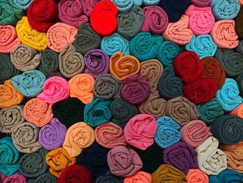 Colorful piles of headscarves that are neatly arranged when sold in markets, medan, indonesia