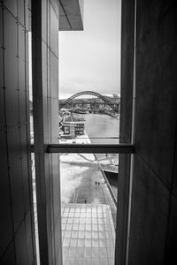 Buildings seen through glass window