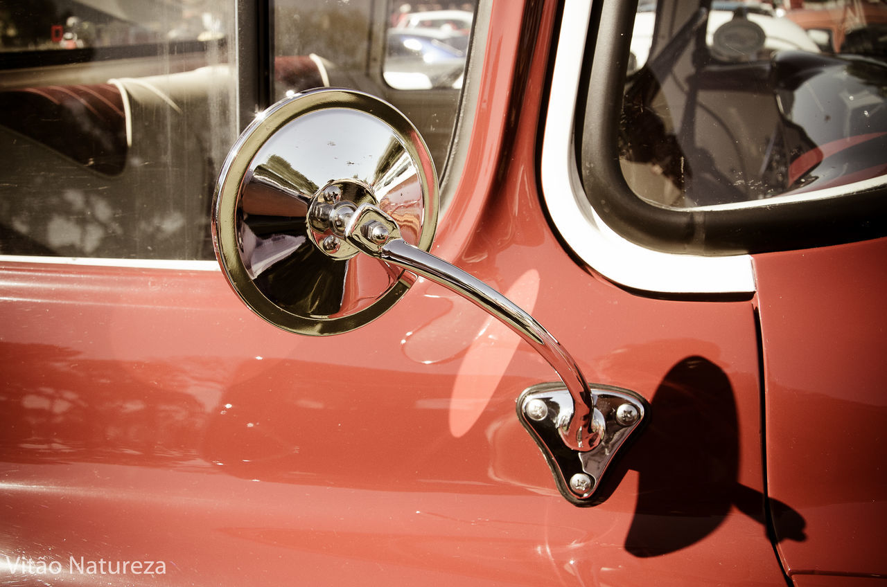 transportation, mode of transport, land vehicle, stationary, motorcycle, wheel, parking, parked, part of, vehicle part, close-up, day, outdoors, parking lot, tire, no people